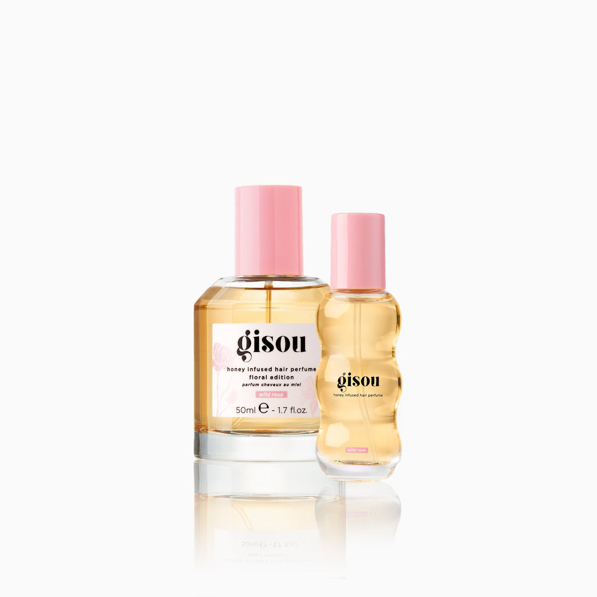 One full size and one mini hair perfume bottle with pink caps.